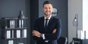 Attorney that uses law firm marketing taking a picture for his website - Attorney that uses law firm marketing taking a picture for his website - Above The Bar - Attorney that uses law firm marketing taking a picture for his website - Above The Bar